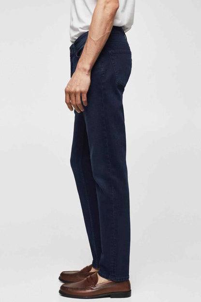 Mango deep dark blue straight jeans, side view with belt loops and cuffed hem