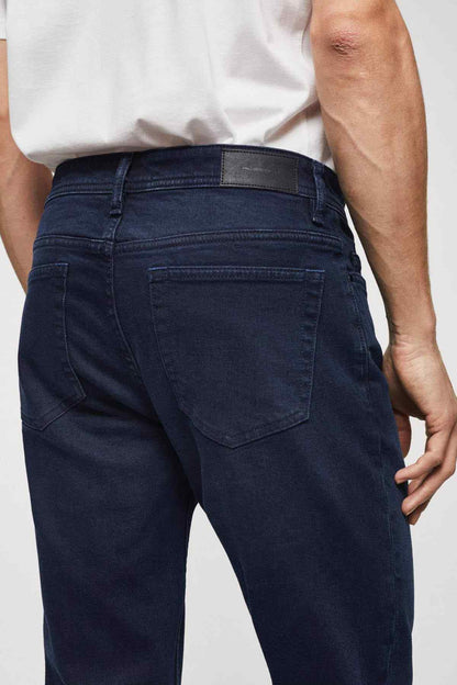Mango dark blue jeans close-up of back yoke and patch pocket detail
