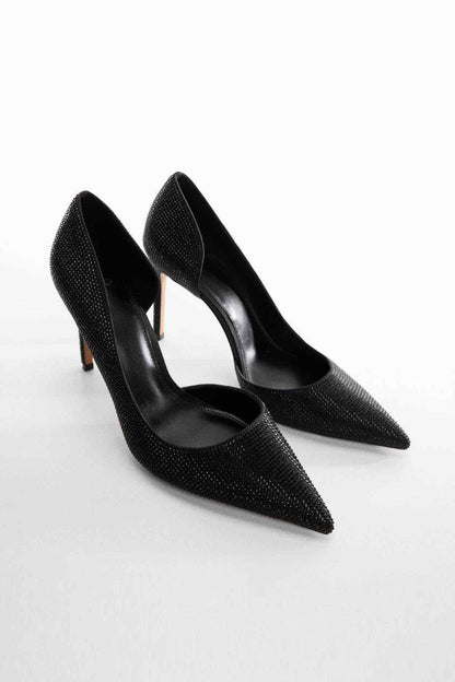 Black pointed-toe stiletto pumps with textured finish and high heel