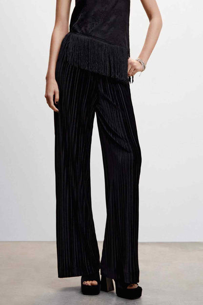 Black wide-leg trousers with vertical pleated texture and long fringe trim
