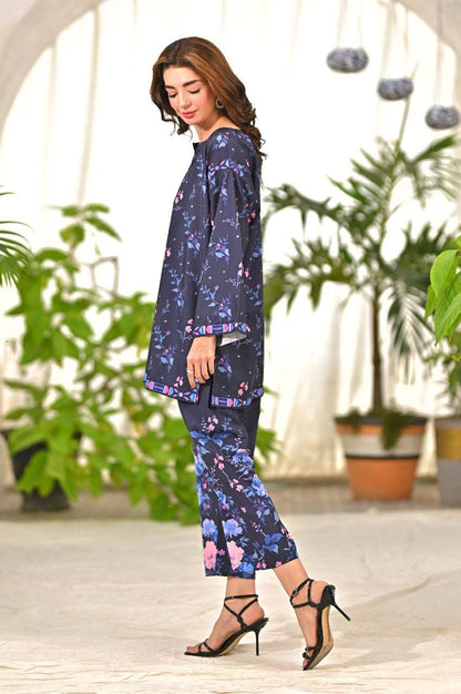 Floral tunic and ankle pants set, navy pink blossom print, side view with 3/4 sleeves