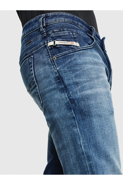 Blue denim jeans with belt loops and stitched front pocket details.