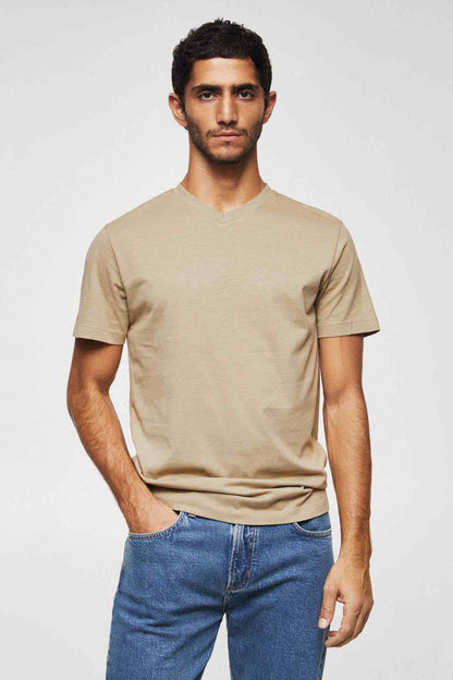 MANGO beige V-neck short-sleeve T-shirt on model, slim fit