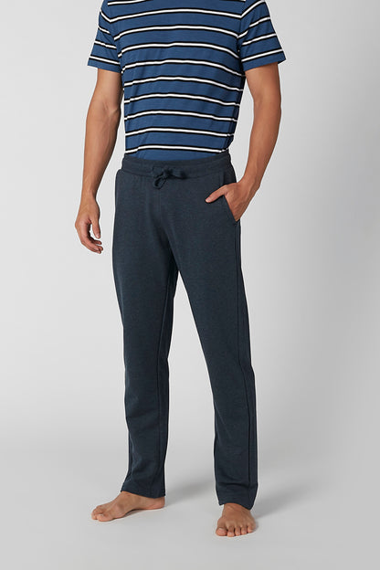 Navy and white striped short-sleeve shirt with dark drawstring lounge pants