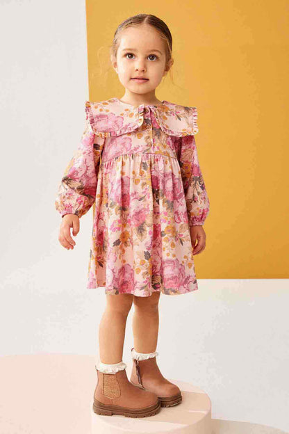 Girls pink floral long-sleeve dress with wide ruffled neckline and tiered skirt