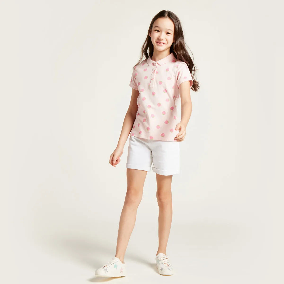 Kids pink strawberry print polo shirt with collar and button placket
