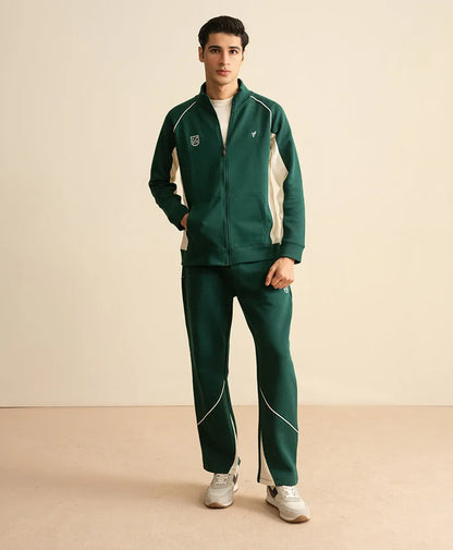 Fitted dark green track pants with contrast white piping and logo details