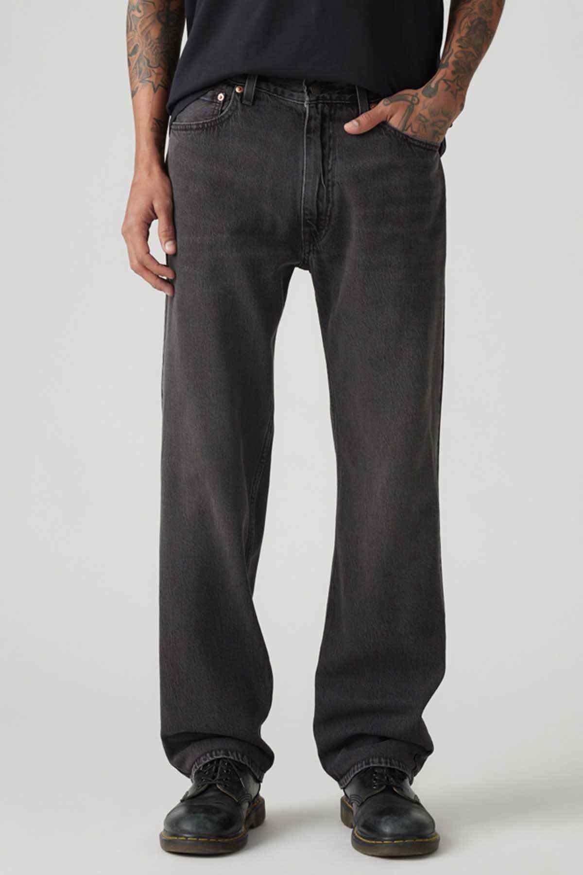 Levi's black denim jeans with straight legs and visible front button and pockets