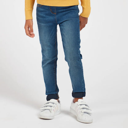Cuffed blue denim jeans with stitched seams and belt loops
