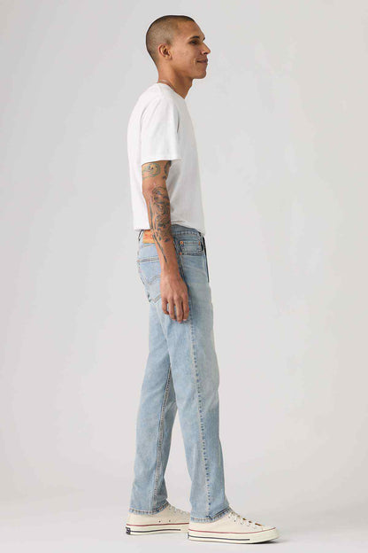 Levi's light-wash denim jeans side view with straight leg stitching