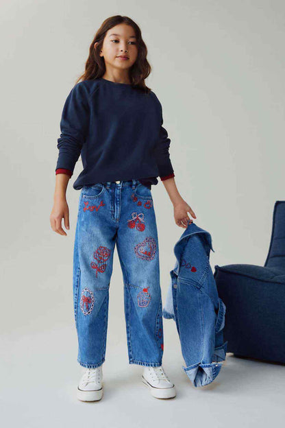 Kids blue denim jeans with red embroidered heart and bow motifs, straight fit