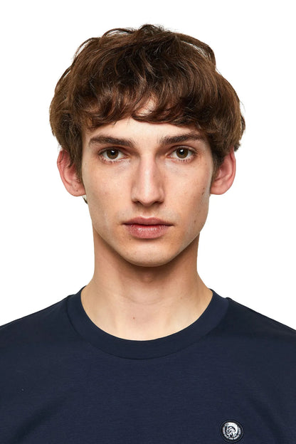 Men's dark blue T-shirt close-up of crew neck and small chest logo