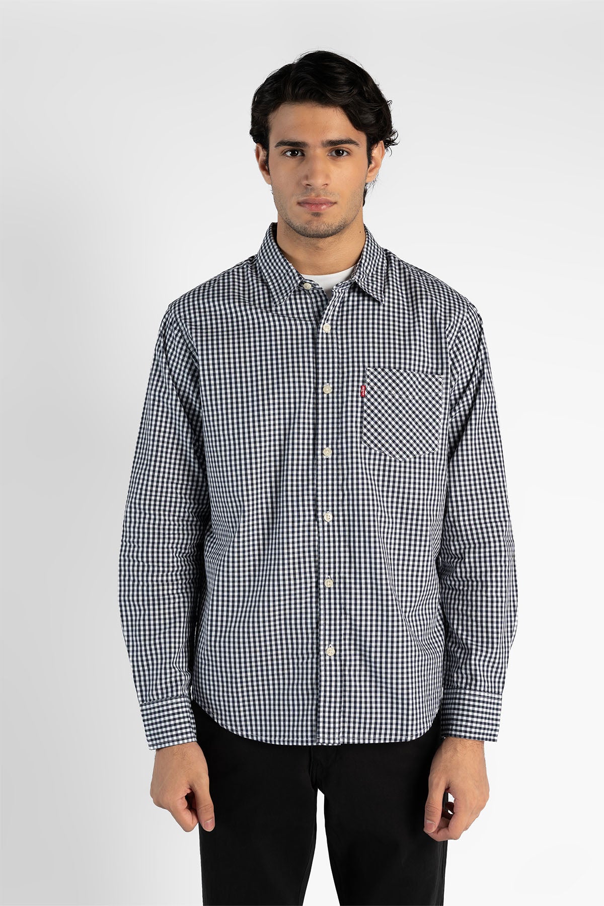 Men's Levi's black-and-white check button-up shirt with chest pocket, front view