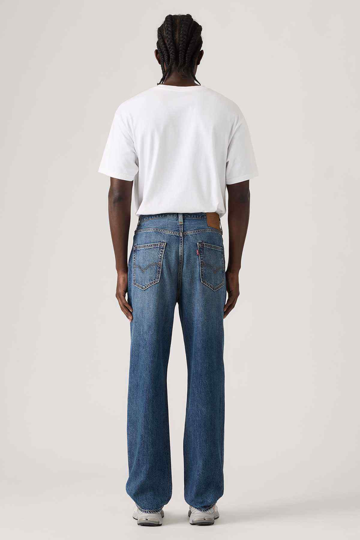 Dark wash denim jeans with back yoke and rear patch pockets