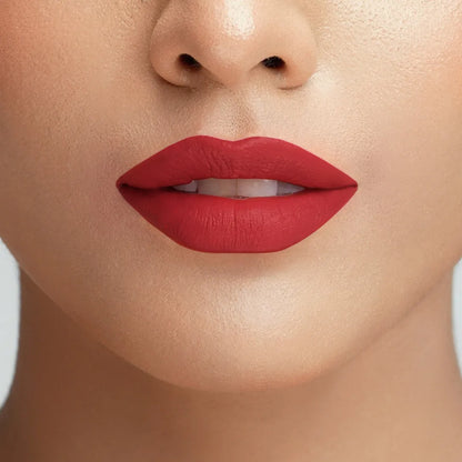 Red velvet lipstick on close-up lips with matte-satin finish