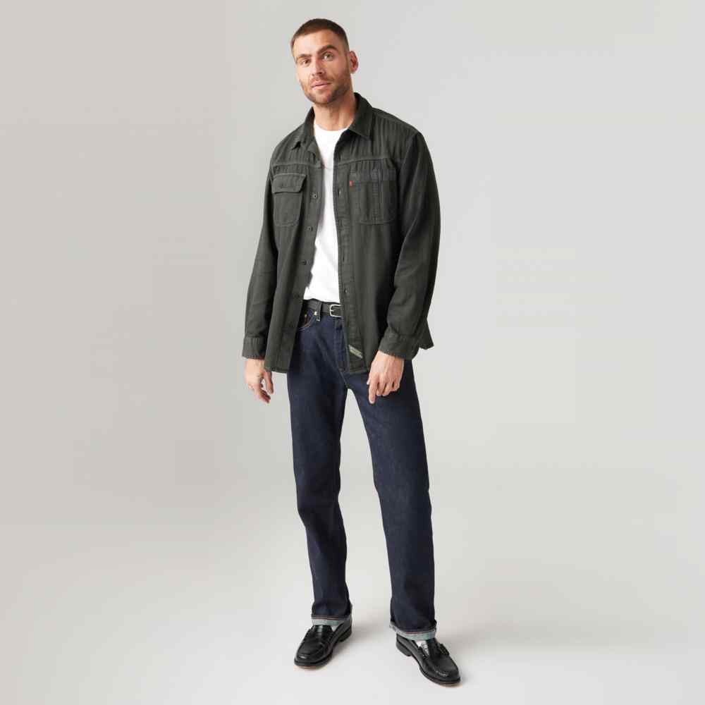 Dark wash denim jeans with straight leg, belt loops, and front pocket stitching