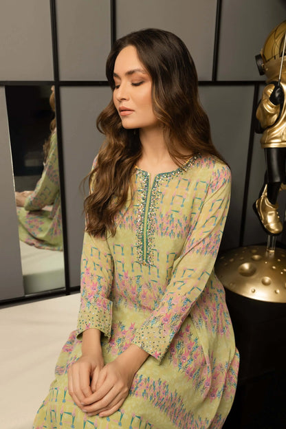 Pistachio printed tunic dress close-up of round neckline and cuffed sleeves