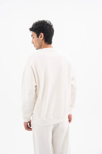 Off-white crewneck sweatshirt and sweatpants set, full outfit back view