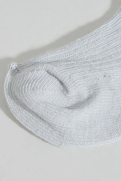 BABYSHOP baby sock, light gray close-up of ribbed knit toe and heel