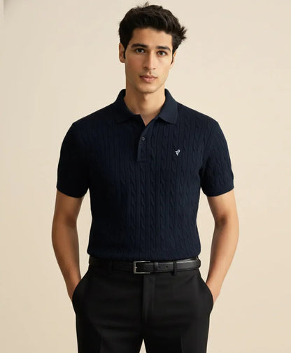 Navy textured knit polo shirt with short sleeves, button placket, and ribbed collar