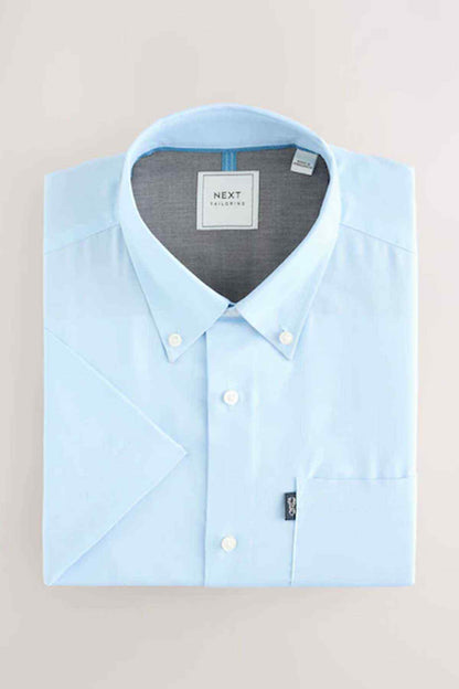 Light blue short-sleeve button-up shirt on hanger with neck label and collar buttons