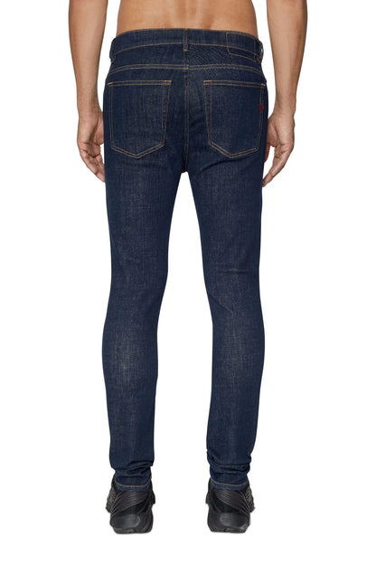 Dark blue denim jeans back view with two rear pockets and belt loops.