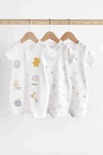 Baby short-sleeve bodysuit set in white with animal and rainbow prints, snap buttons