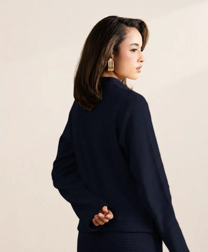 Navy long-sleeve jacket with stand collar shown from the side