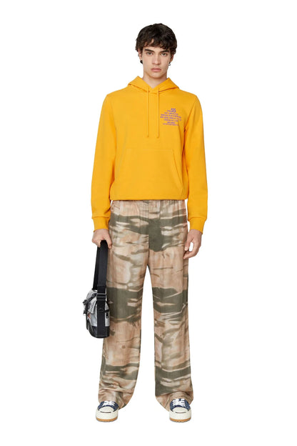 Mustard Diesel pullover hoodie front view with drawstring hood