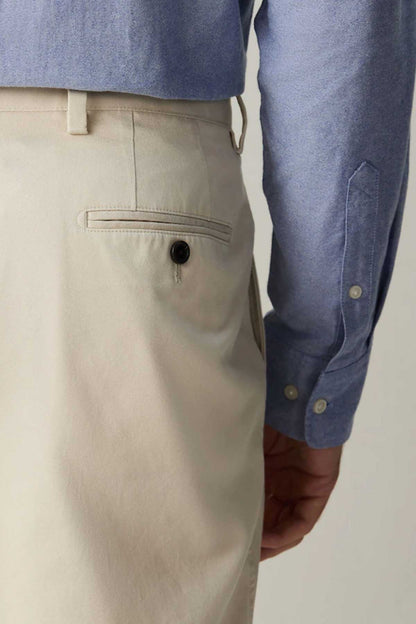 NEXT ecru suit trousers pocket flap with round dark button and stitched detail