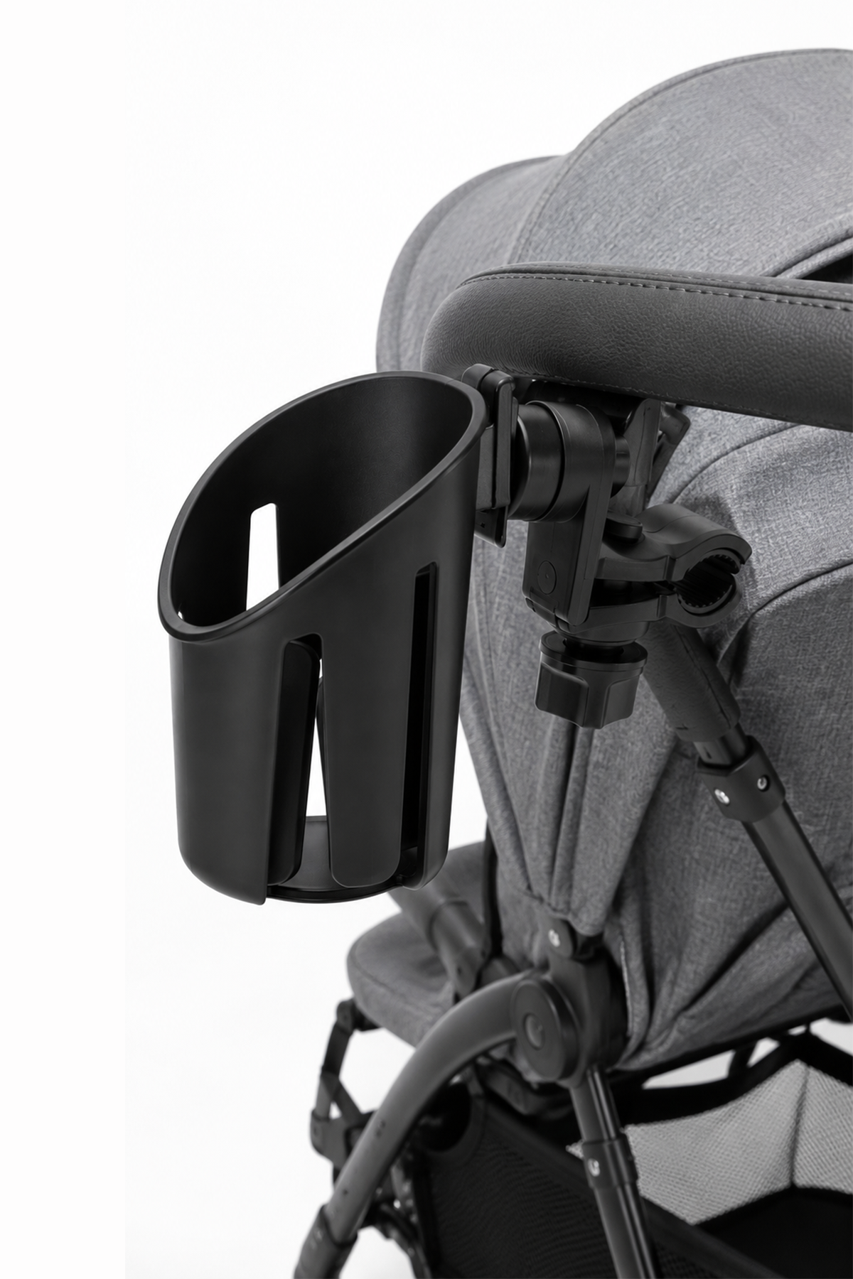 Black stroller cup holder mounted on the arm of a gray pushchair.