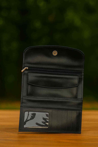 Black leather wallet open showing card slots and a zip pocket
