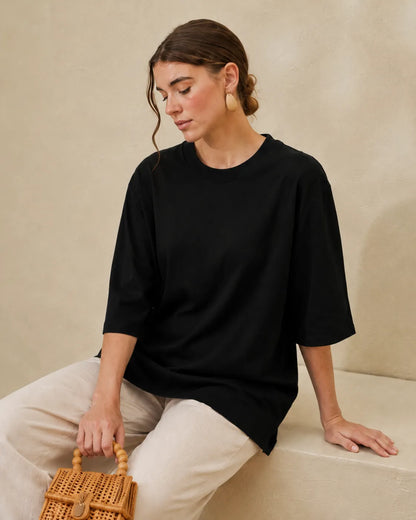 Black crew-neck short-sleeve t-shirt with straight hem, laid-back fit