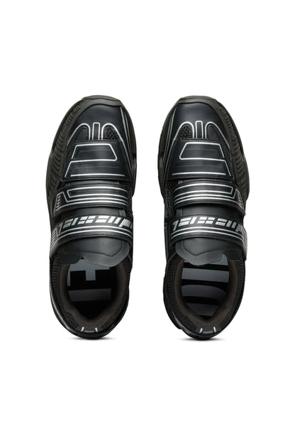Black sneakers front view with dual straps and contrast logo trim