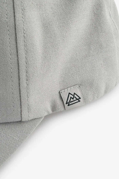 Grey cap side panel with stitched logo patch