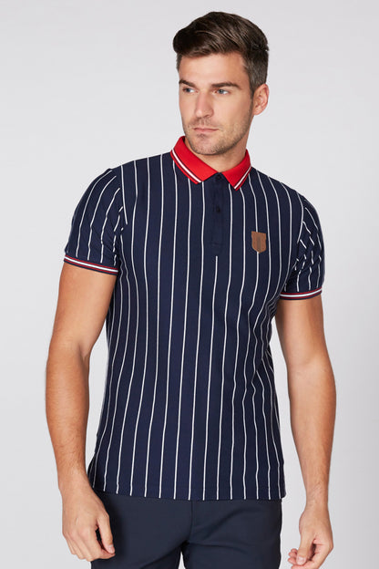 Navy striped polo shirt with red collar and sleeve trim, button placket, chest logo patch