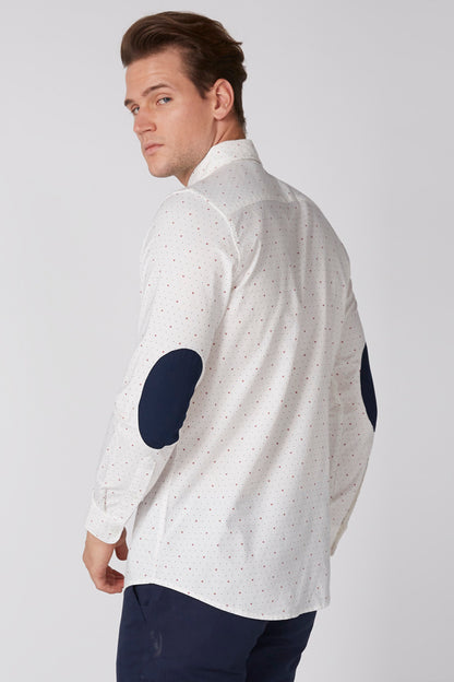 White button-up shirt with dotted print and navy oval side sleeve accents