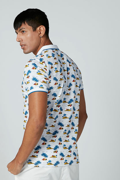 Men's white polo shirt with tropical print, short sleeves and collar, side view
