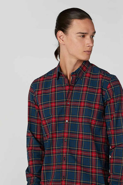 Men’s red-and-blue plaid button-up shirt, chest close-up with collar