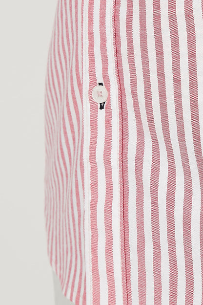Close-up of striped shirt placket with button and collar detail