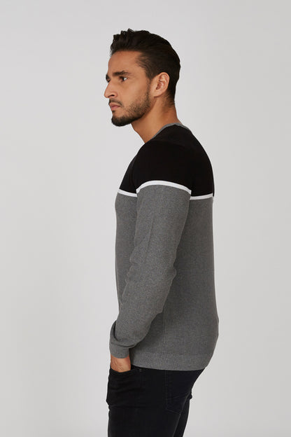 Two-tone black and grey crewneck long-sleeve sweatshirt with white stripe, side view