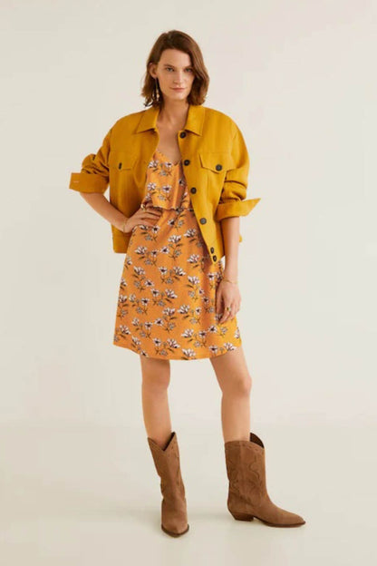 Mustard floral sleeveless mini dress with V-neck and spaghetti straps, front view