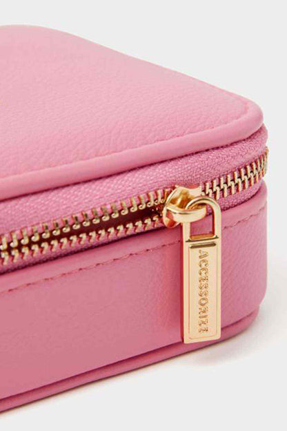 Pink mini pouch with gold zipper pull and zipper detail