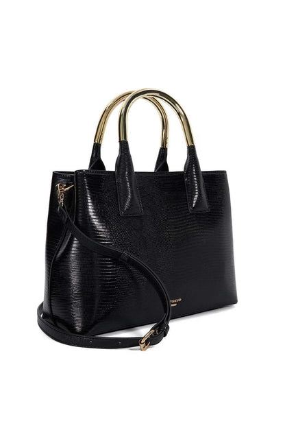 Black tote bag with gold handles, front pocket, and crossbody strap