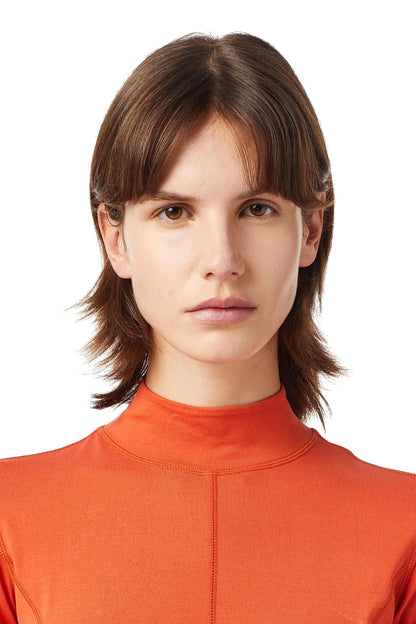 Diesel orange mock-neck zip top with high collar, close-up