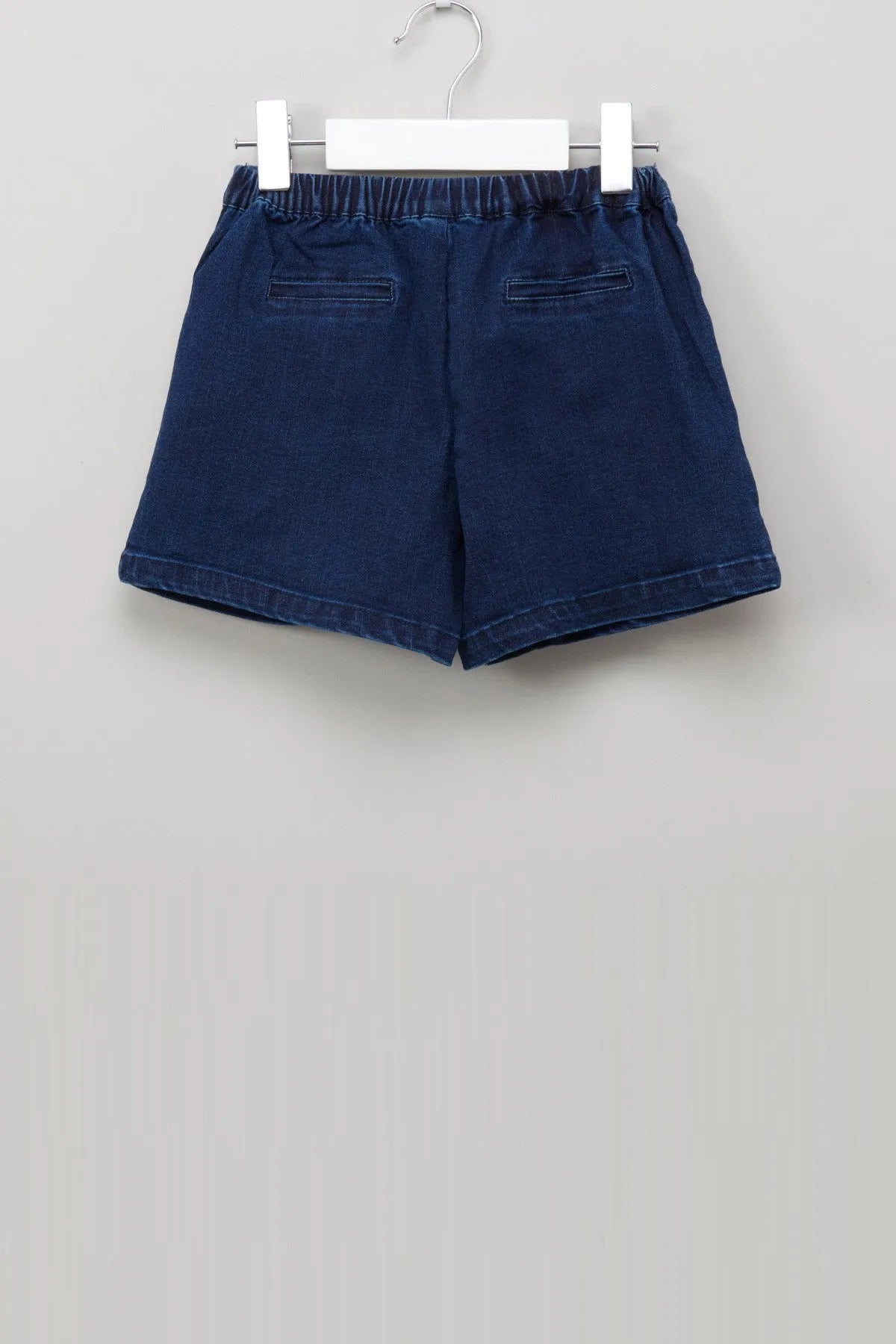Navy denim baby shorts with elastic waistband and back pockets