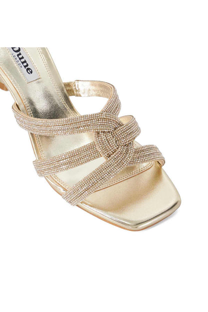 Gold heeled sandal detail, braided rhinestone crisscross straps