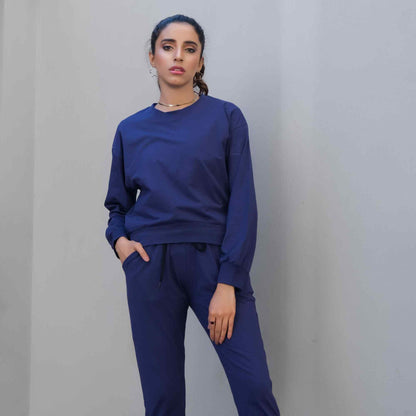 Navy crewneck sweatshirt with drawstring joggers, long sleeves, relaxed matching set