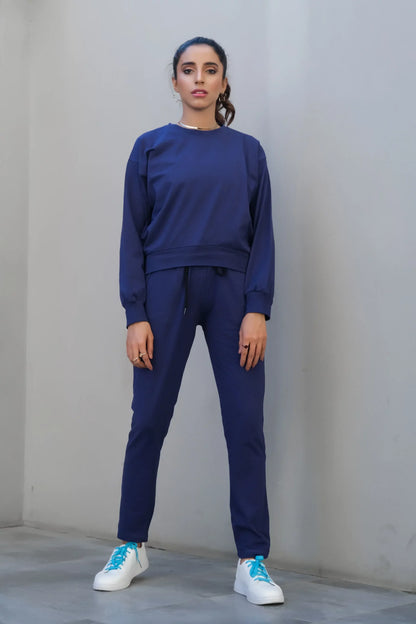Navy crewneck sweatshirt and drawstring jogger pants, full-length matching set