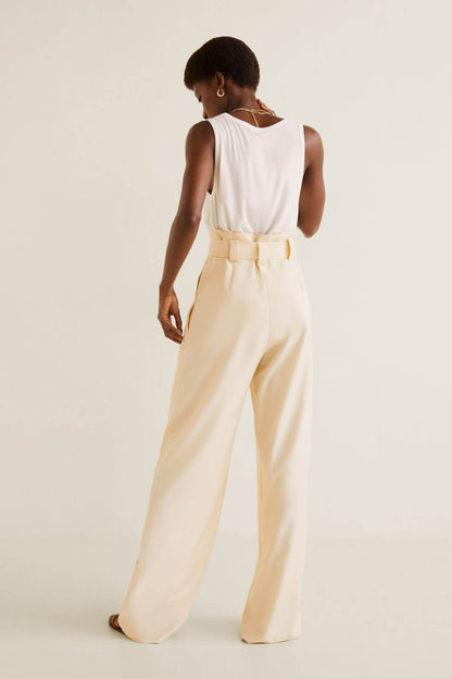 Women's off-white wide-leg pants with sleeveless tank top set, back view